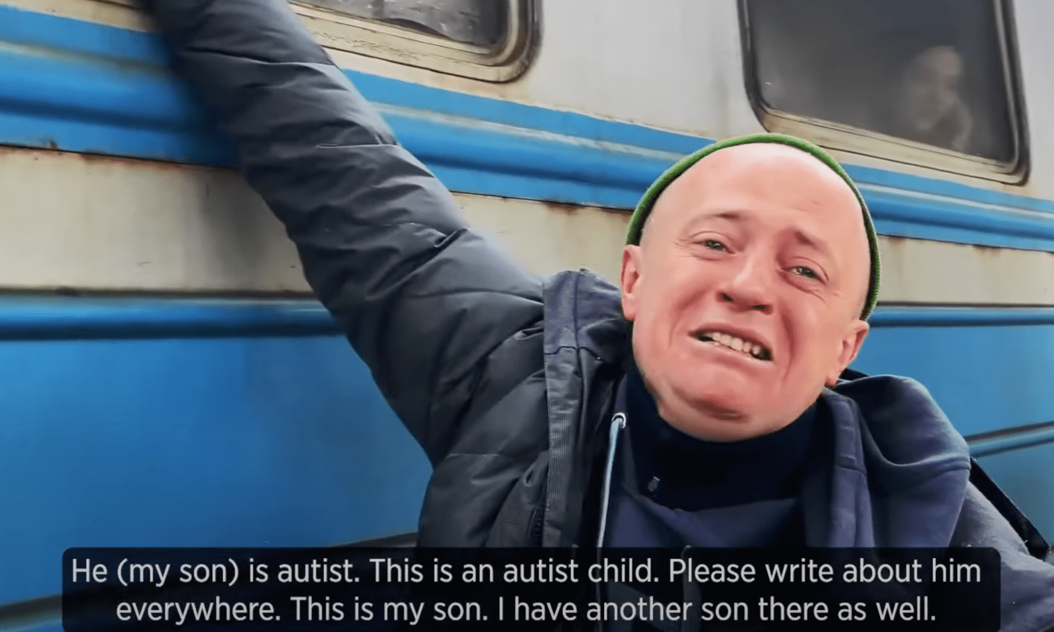 Ukrainian father bids farewell to autistic son after he chose to stay to 'protect the city 03-min