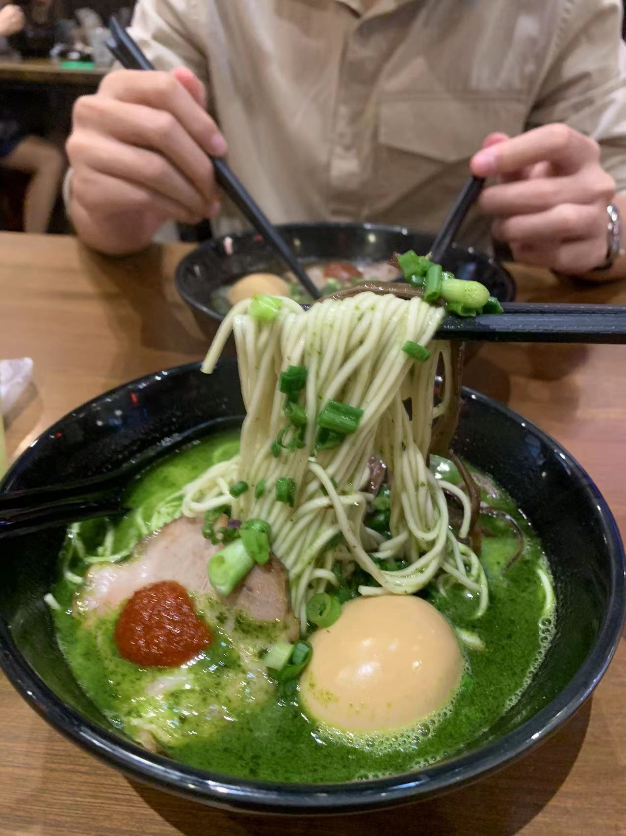 This ramen bar in gasket alley actually serves its noodles in a green broth as its soup base | weirdkaya